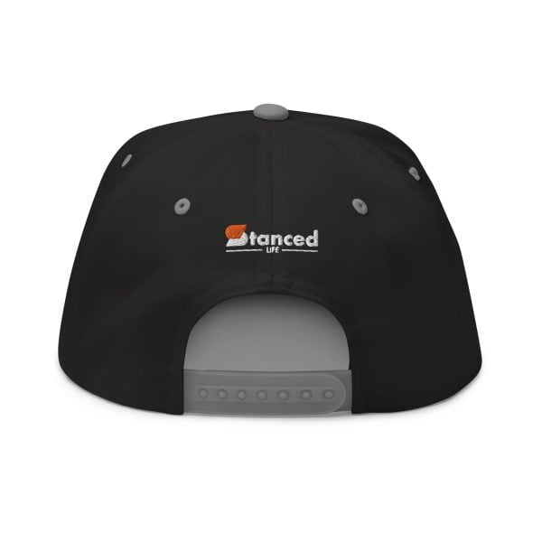 A Toyota Supra MKIV "The Samurai" flat bill cap with the word streed on it and a flat bill cap.