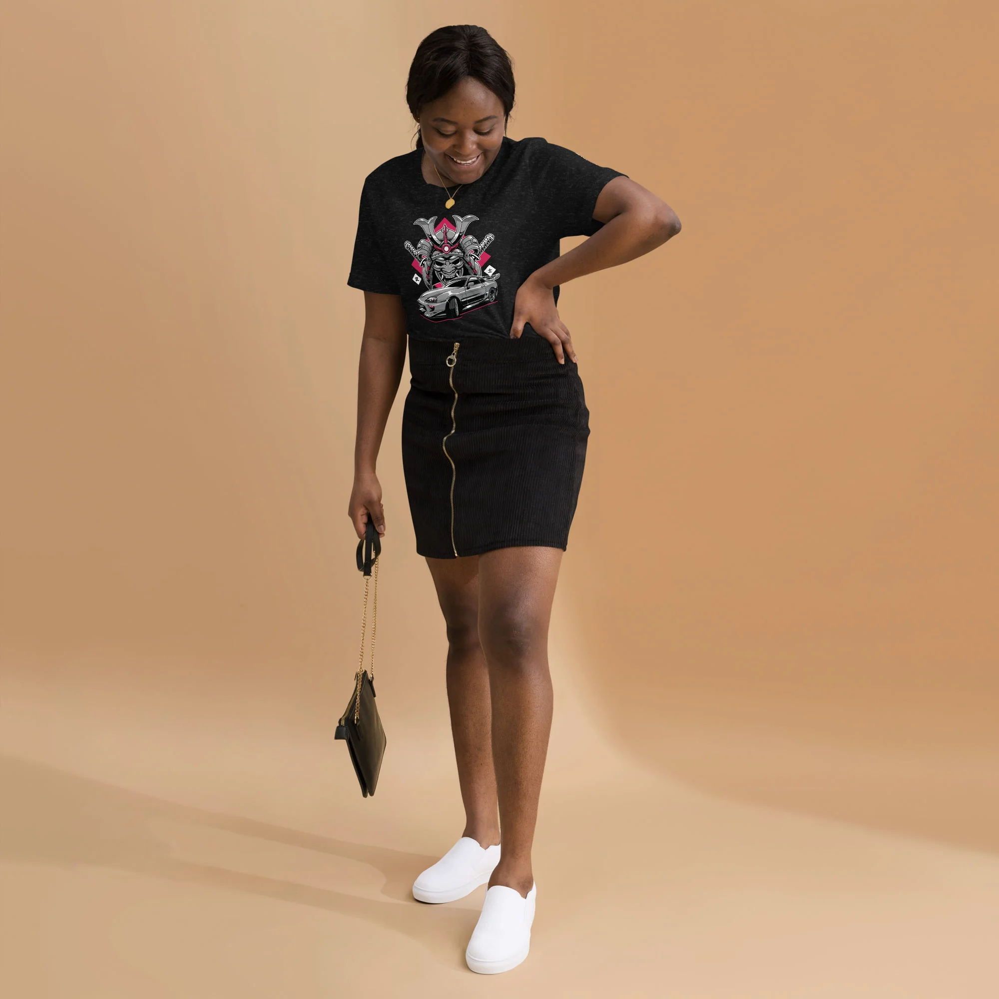 A woman wearing a Toyota Supra MKIV "The Samurai" unisex t-shirt and skirt.