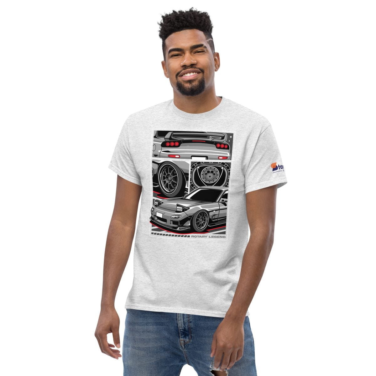 A man wearing a 3rd Gen Mazda RX 7 Rotary Legend Mens Classic T shirt with an image of a Mazda RX 7 race car | StancedLife