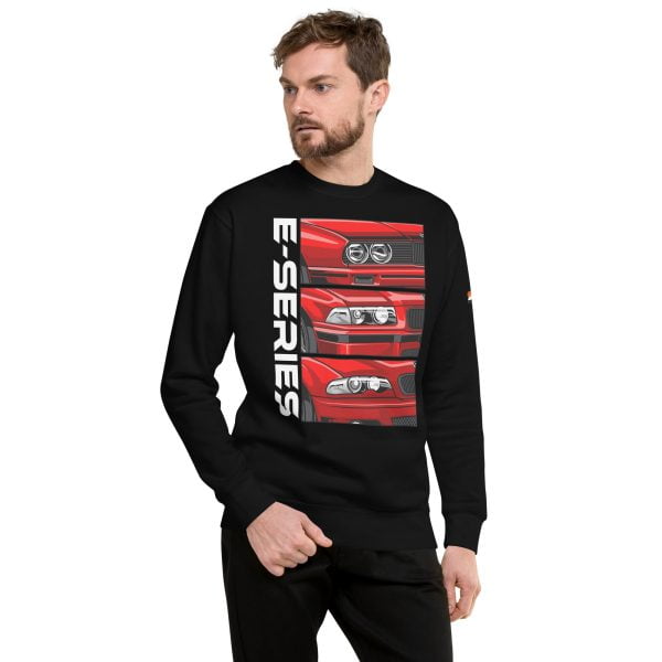 A man wearing a BMW 3 Series E30 E36 E40 Unisex Premium Sweatshirt with a red car on it.