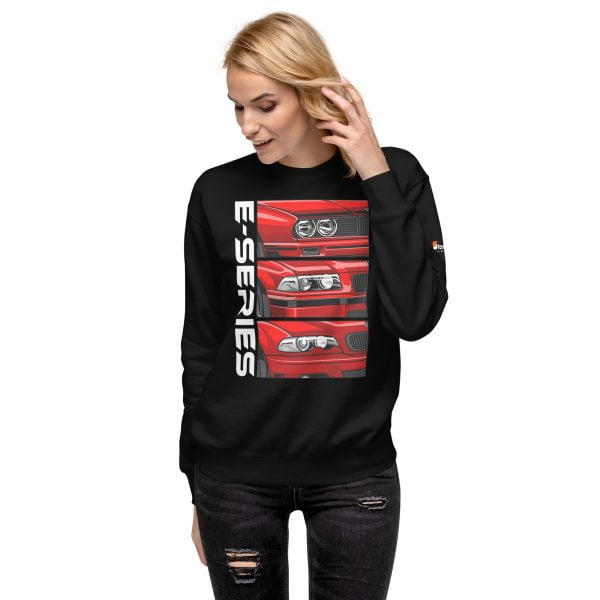 An BMW 3 Series E30 E36 E40 Unisex Premium Sweatshirt wearing a black sweatshirt with a red car on it.