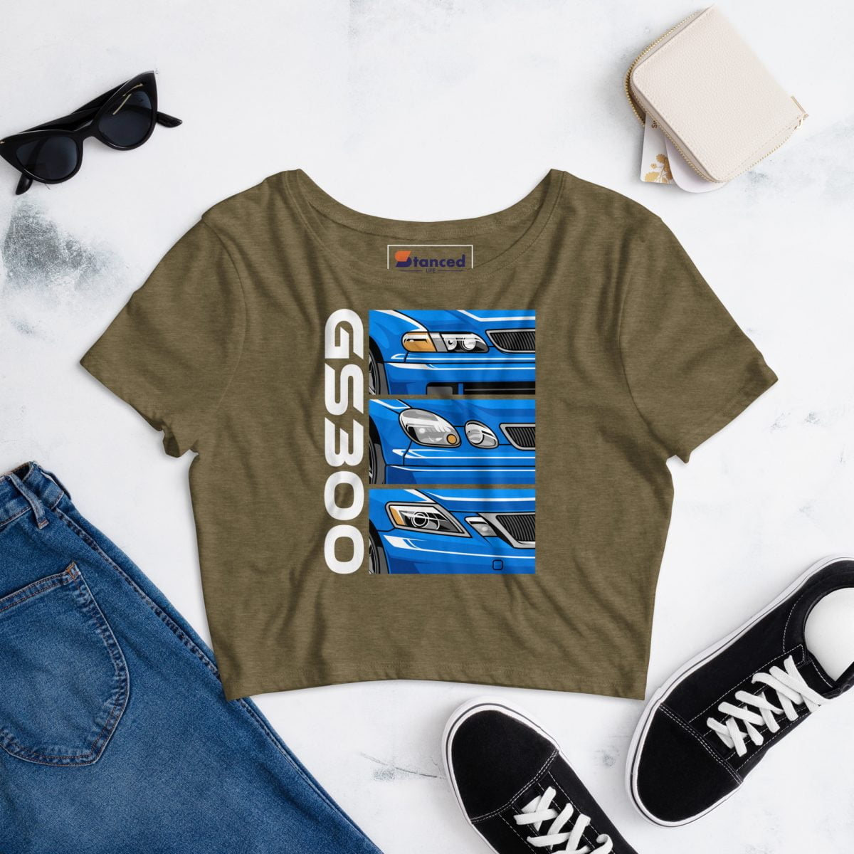 A womens cropped t shirt featuring an image of a blue car specifically the Lexus GS300 JZS161 Generations Womens Crop Tee | StancedLife